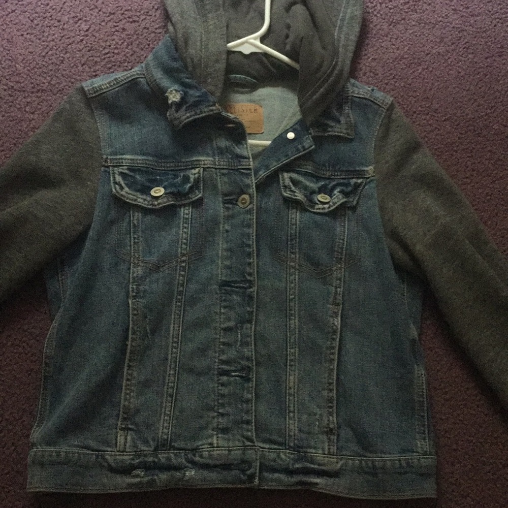 Ripped Hollister jean jacket with gray sleeves